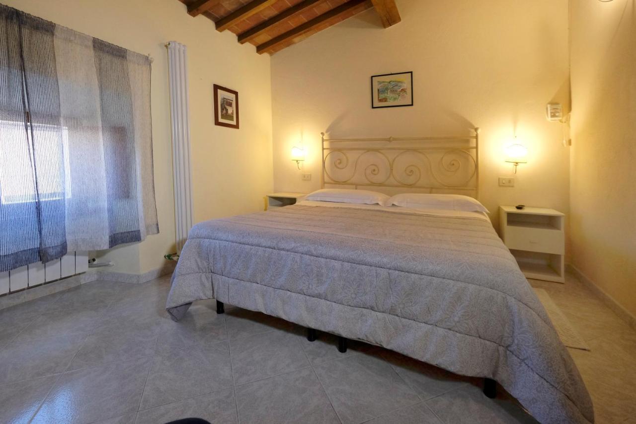 Oliviera Camere Pienza Bagian luar foto
