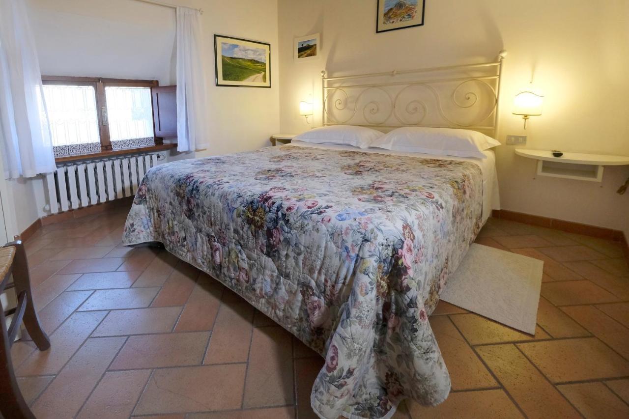 Oliviera Camere Pienza Bagian luar foto