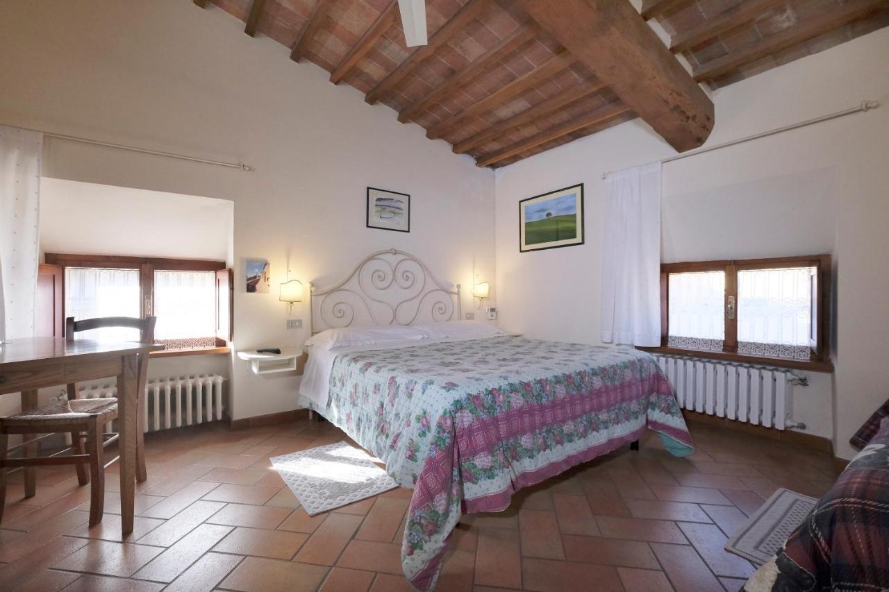 Oliviera Camere Pienza Bagian luar foto