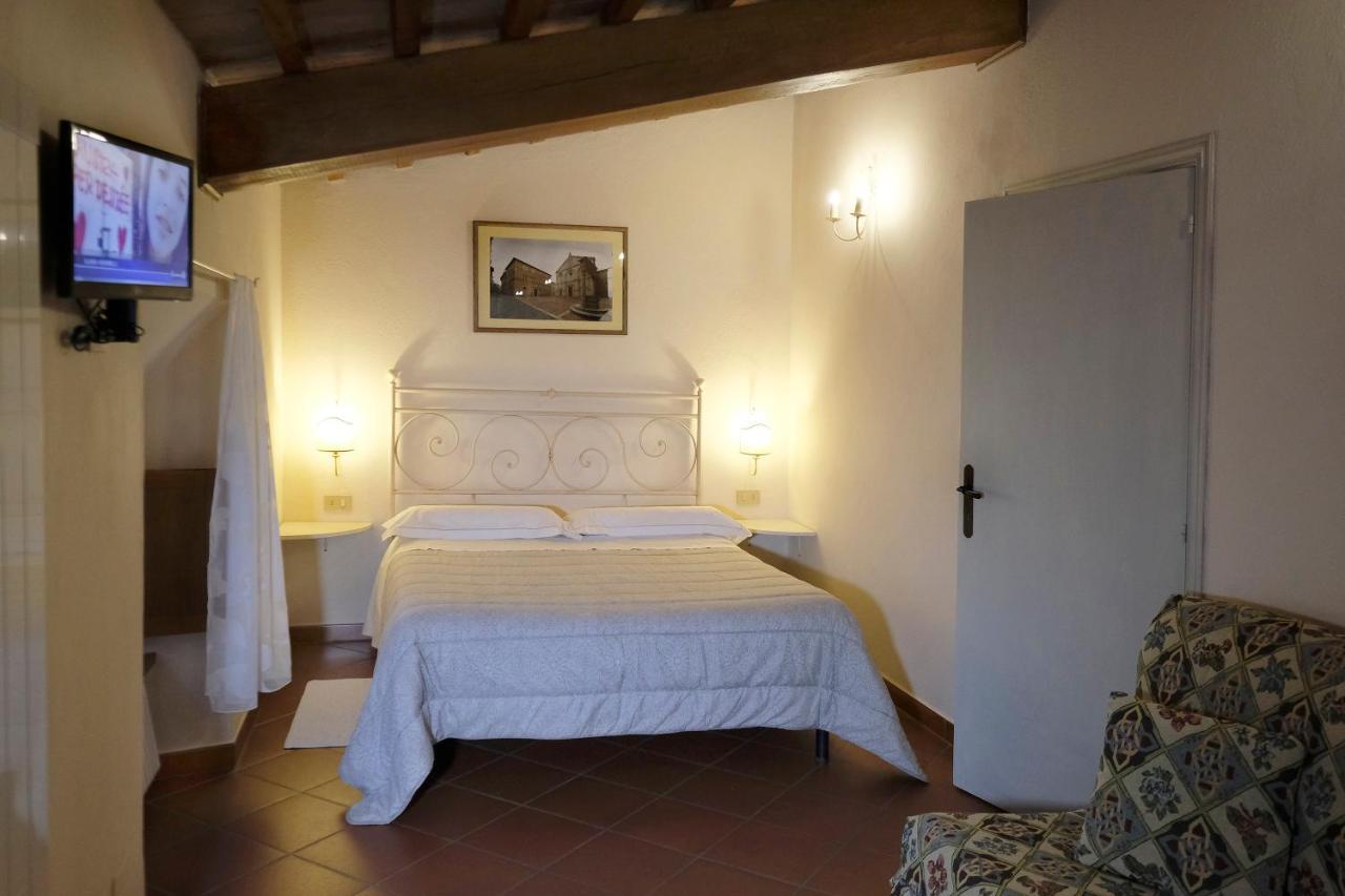 Oliviera Camere Pienza Bagian luar foto
