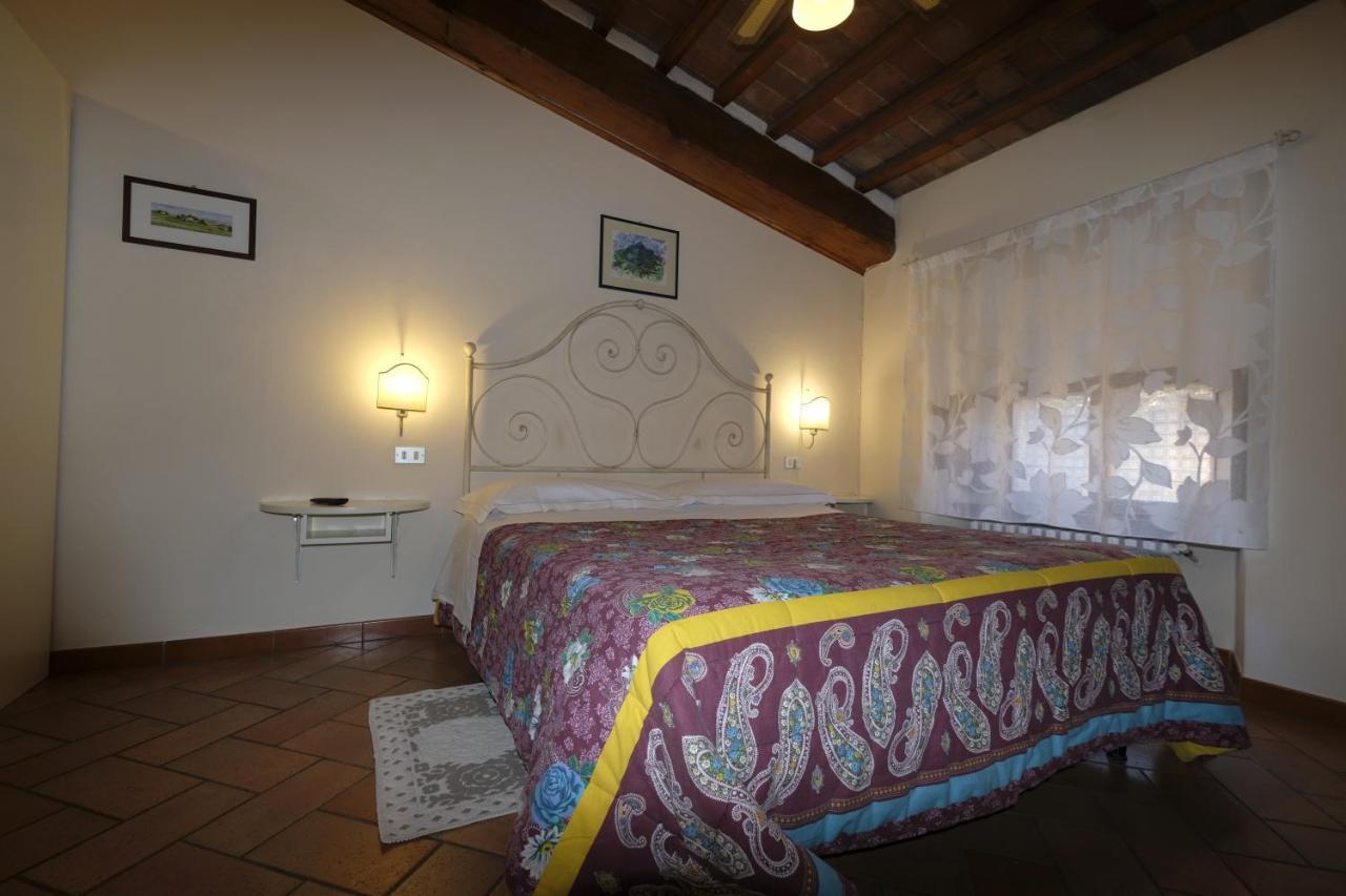 Oliviera Camere Pienza Bagian luar foto
